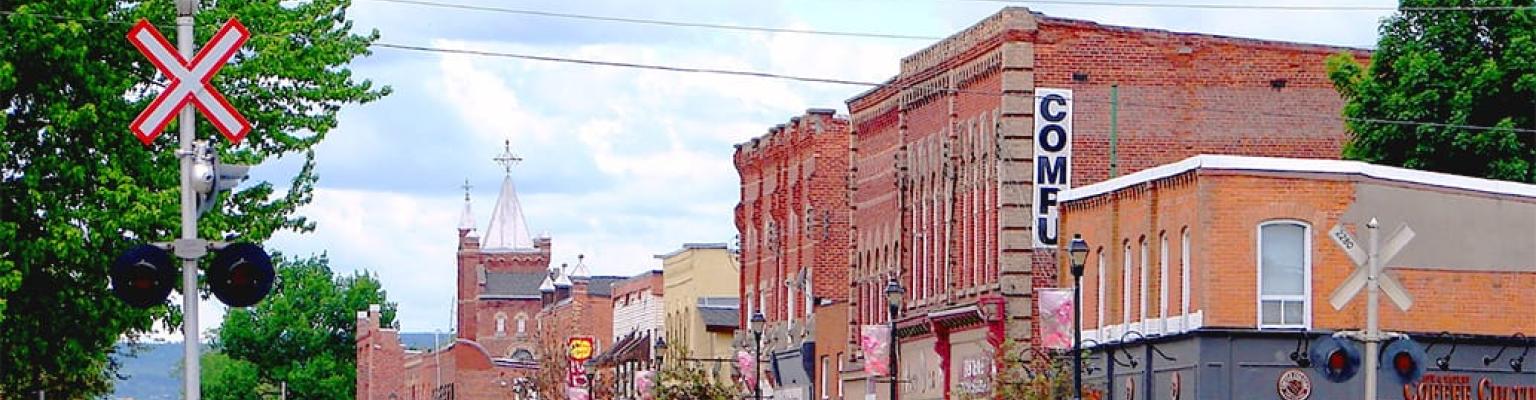 A city street with retail shops in Clearview